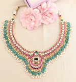 Jadau kundan peacock short necklace with pearl and natural strawberry beads drop