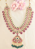 Jadau kundan 2 line peacock long necklace with pearl and natural strawberry beads drop