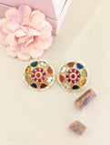 Jadau kundan navratna studs with pearl motif