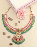 Jadau kundan peacock necklace with pearl and natural strawberry beads drop(Without earrings)