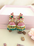 Jadau kundan peacock jhumkas with pearl and natural strawberry beads