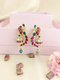Jadau kundan peacock jhumkas with pearl and natural strawberry beads