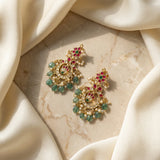 Jadau kundan chand bali with pearl drops and natural strawberry beads