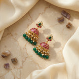 Jadau kundan jhumkas with pearl and natural strawberry beads drop