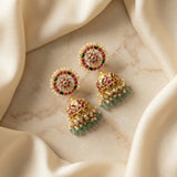 Jadau kundan jhumkas with pearl and natural strawberry beads