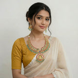 Jadau kundan Navratna goddess laxmi necklace set with earrings with pearl and natural strawberry beads drop