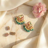 Jadau kundan peacock studs with pearl and natural strawberry beads