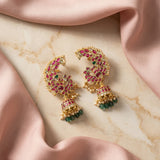 Jadau kundan peacock jhumkas with pearl and natural strawberry beads drop