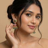 jadau kundan jhumkas with pearl and natural strawberry beads drop