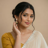 Jadau kundan jhumkas with pearl and natural strawberry beads drop