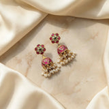 Jadau kundan jhumkas with pearl and natural strawberry beads drop