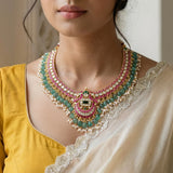 Jadau kundan peacock short necklace with pearl and natural strawberry beads drop