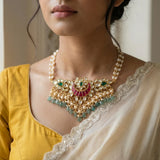 Jadau kundan choker with pearl and natural strawberry beads drop