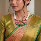 Jadau Kundan Godess Laxmi Choker with Pearls and Natural Strawberry Beads